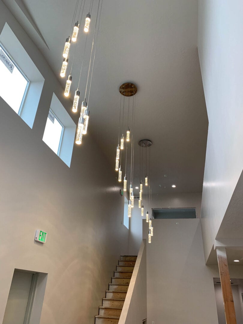 A long hallway with several lights hanging from the ceiling in Salt Lake City, Utah