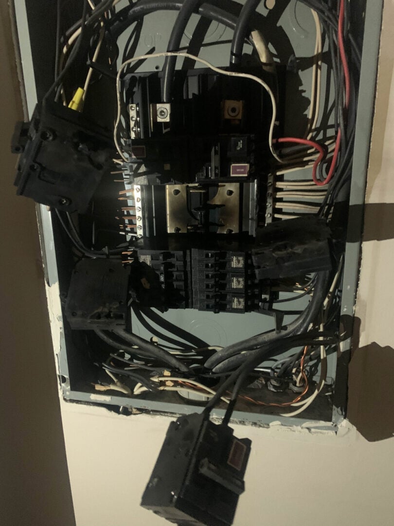 A close up of an electrical panel with wires in Sandy, UT