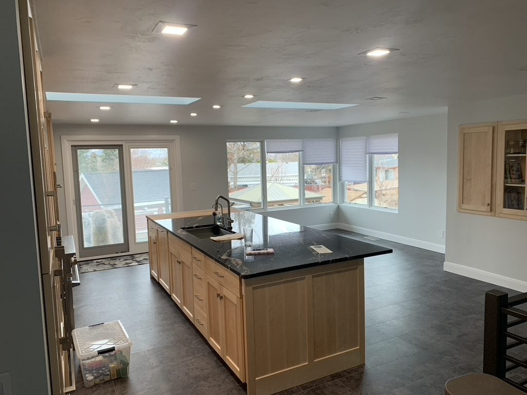DC61C176-C363-4D4F-B442-E5361BD6851F_1_105_c A kitchen remodel with can lighting fixtures installed in Salt Lake City, UT