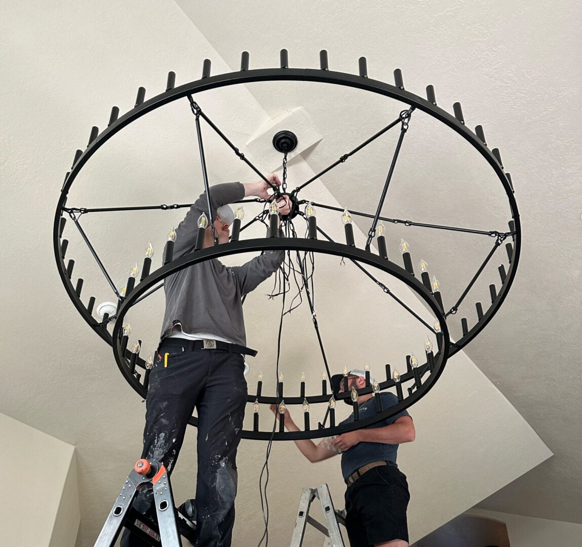 Electrical Contractor installing new lights in Sandy Utah